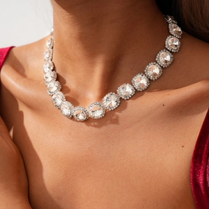 Detail view of double-layer crystal choker necklace with geometric pave accents