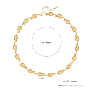Detail of gold stainless steel necklace showing teardrop links and adjustable chain length