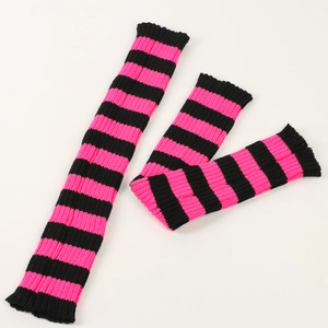 Detail of pink and black striped knit leg warmers showing texture and elasticity