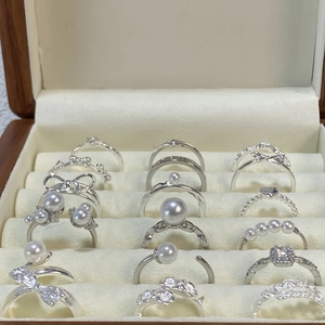 925 Sterling Silver Ring Collection with Pearls and Crystals in a Beige Jewelry Box