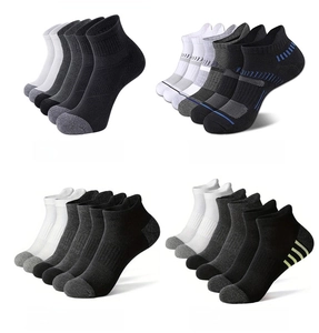 Detail of four athletic sock styles showing ribbed cuffs and reinforced grey heels