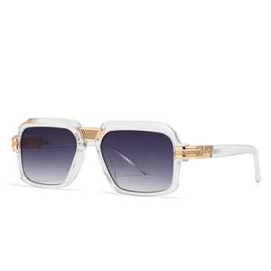 Modern oversized square sunglasses with transparent frames and gold metal accents
