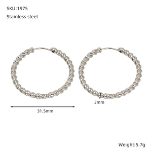 Detailed view of 31.5mm twisted stainless steel hoop earrings with size specifications