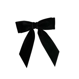 Elegant black velvet bow hair clip with long ribbons for a vintage French aesthetic look