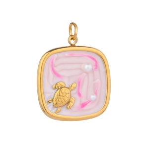 Detailed view of a gold-plated square pendant with turtle motif and pearls on white background