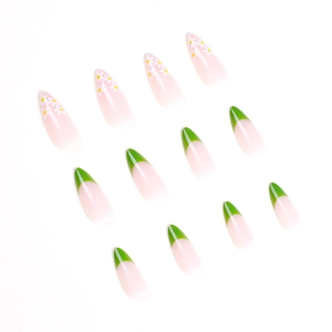 Short green French tip press-on nails with white daisy floral design on nude base