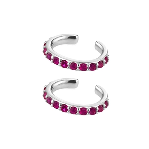 Detail of silver ear cuffs featuring a row of vibrant fuchsia rhinestones on white background