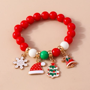 Close-up of Christmas beaded bracelet with snowflake, Santa hat and tree charms