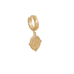 Detail shot of golden religious medallion earring with Virgin Mary relief on white background