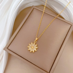 Elegant gold titanium steel daisy flower necklace with white cubic zirconia in box
