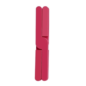 Folded dark pink silicone heat insulation mat in a compact storage state on white background