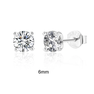 Macro detail of 2 carat round moissanite earrings in 925 sterling silver with hallmarks