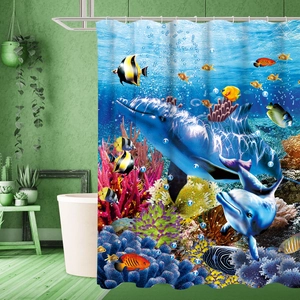 Detailed view of ocean theme shower curtain with blue dolphins and colorful coral reef