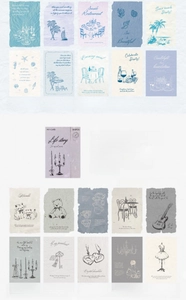 Close-up of vintage hand-drawn scrapbooking stickers featuring retro cats and lamps