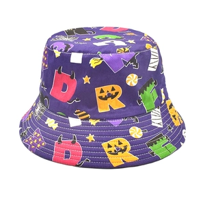Detailed view of Halloween purple bucket hat featuring festive pumpkin and ghost prints