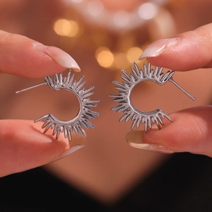 Silver stainless steel C-shaped sunflower earrings with radiant spiked sunburst design