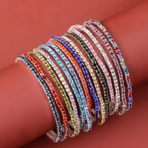 Close-up of multicolored crystal tennis bracelets with silver plating on a display stand