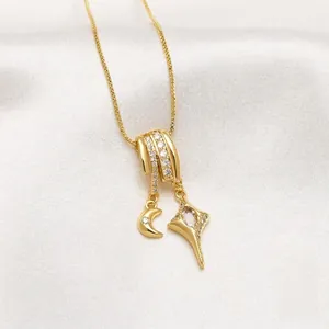 18K gold plated necklace with zircon crescent moon and sparkling star pendant detail