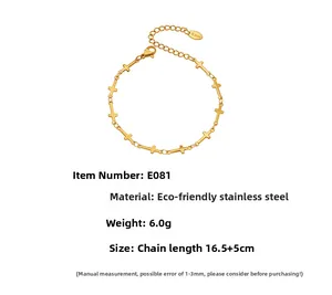 Detail view of 18K gold plated stainless steel bracelet showing cross links and lobster clasp