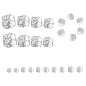White minimalist press on toe nails set with gold foil and stylish cloud leopard patterns
