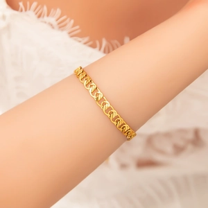 Close-up of elegant 18k gold plated stainless steel hollow Cuban link chain on wrist