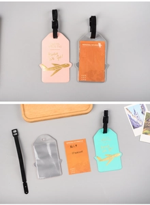 Three PU leather luggage tags in pink, silver, and blue with information cards