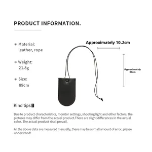 Detail view of black vintage leather key pouch necklace with functional metal snap button
