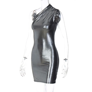 Detail of metallic silver one-shoulder bodycon dress with reflective fabric on mannequin