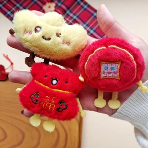 Three cute plush charms including red fortune bag and yellow cloud with embroidery detail