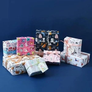 Cartoon kitten gift wrapping paper set with colorful cat and dog patterns for birthdays