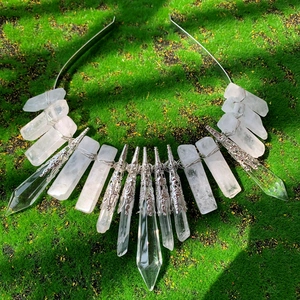 Detail of handmade silver crown headband with natural white clear raw crystal stones