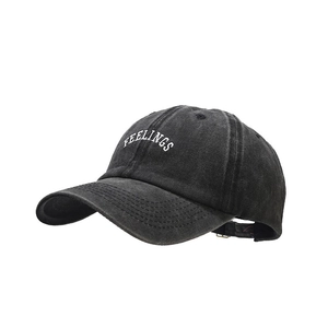 Vintage washed black cotton baseball cap with white Feelings arched embroidery detail