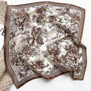Detailed close-up of silk square scarf featuring vintage brown jungle animal toile de jouy print