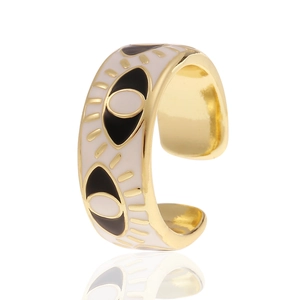Detail shot of golden evil eye ring with black and white enamel finish and open band