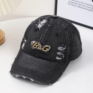 Distressed dark grey denim baseball cap with 3D BAG letter embroidery and torn edge detail