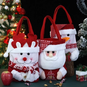 Christmas gift bags with Santa, Reindeer and Snowman designs for holiday candy and treats