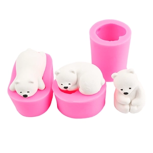 Three polar bear silicone molds with white resin finished teddy bear figurines