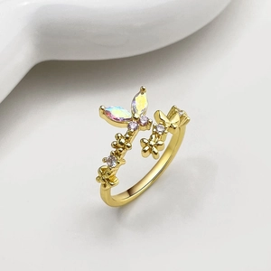 Gold butterfly and flower ring with sparkling crystals and colorful gemstones
