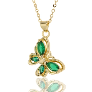 Gold plated butterfly necklace pendant with green gemstones and elegant reflections