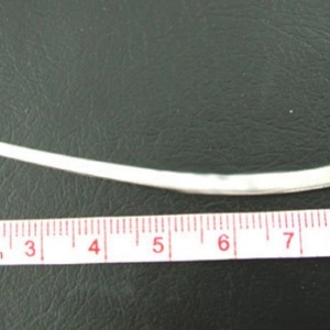 Silver plated DIY bookmark alloy accessory displayed with measuring tape on black surface