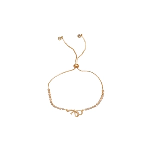 Adjustable gold bracelet featuring a zircon-encrusted bow charm on a delicate metal chain