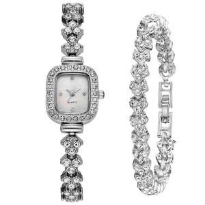 Detail of silver square quartz watch and matching crystal bracelet set on white background