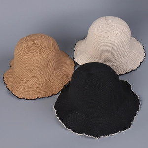 Detailed knit texture and wave trim on black, beige, and camel summer sun hats