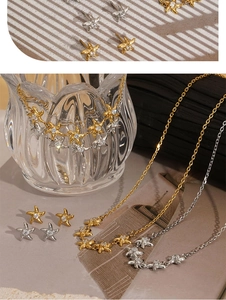 Detailed set of starfish necklaces and stud earrings in gold and silver with zircon