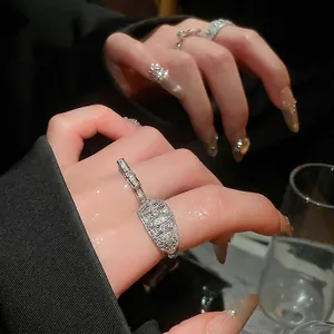 18k gold plated butterfly bow open ring with cubic zirconia on a model's hand