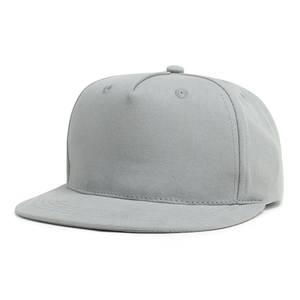 Detailed close-up showing the smooth grey fabric texture and adjustable strap of the flat bill cap
