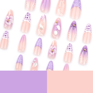 French almond press-on nails with purple gradient, 3D flowers, and golden accents