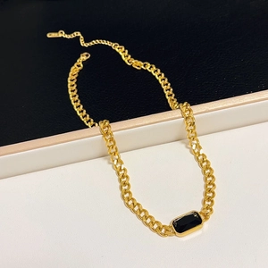 Fashionable gold Cuban link necklace with rectangular black gemstone pendant for jewelry enthusiasts