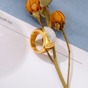 Gold-plated wide band ring featuring a sparkling micro-pave crystal dome design