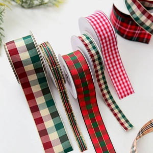 Classic plaid Christmas ribbon assortment in red and green for festive gift wrapping